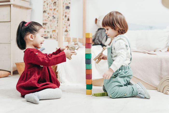 A child playing with colorful building blocks